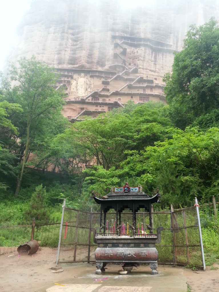 Buddhist Caves High above an Altar