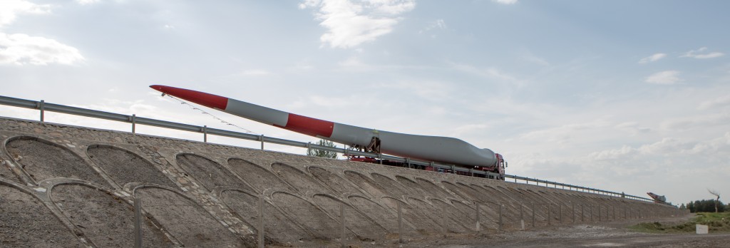 Part of a wind turbine moving along the New Silk Road