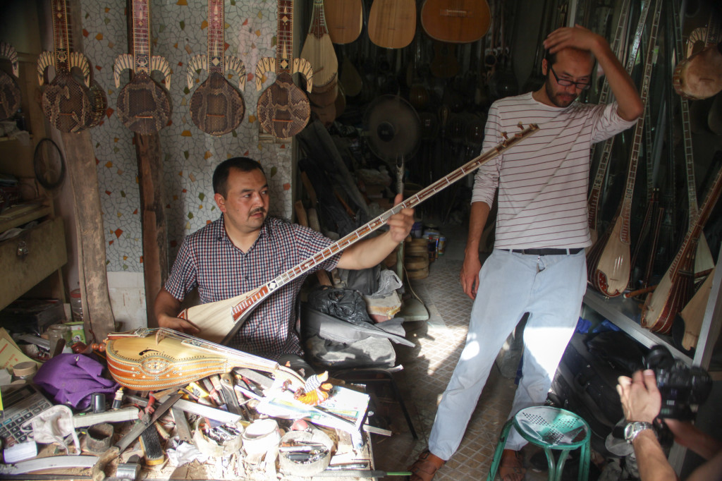 The Luthier playing one of the Dutars he made.